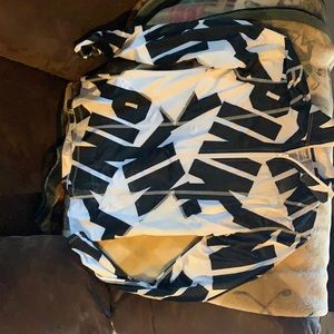 Pink Victoria’s Secret black and white light shirt